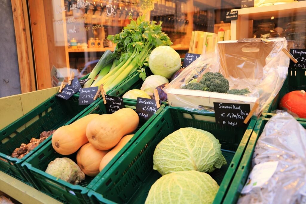 Vibrant fresh vegetables on display at a local market in Antwerp, Belgium.